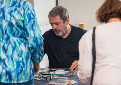 Angus Macfaden signs posters for Braveheart year reunion