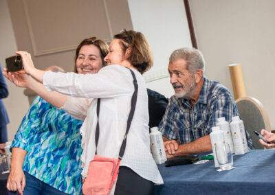 Fans take selfies with Mel Gibson