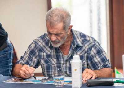 Mel Gibson autographing posters for Braveheart in Trim