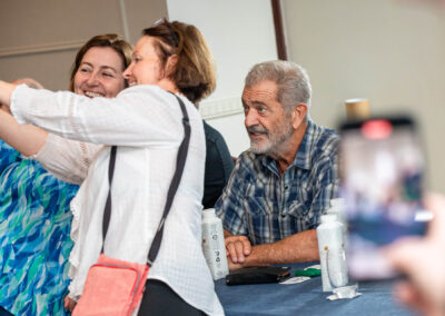 Mel Gibson poses for photos with fans